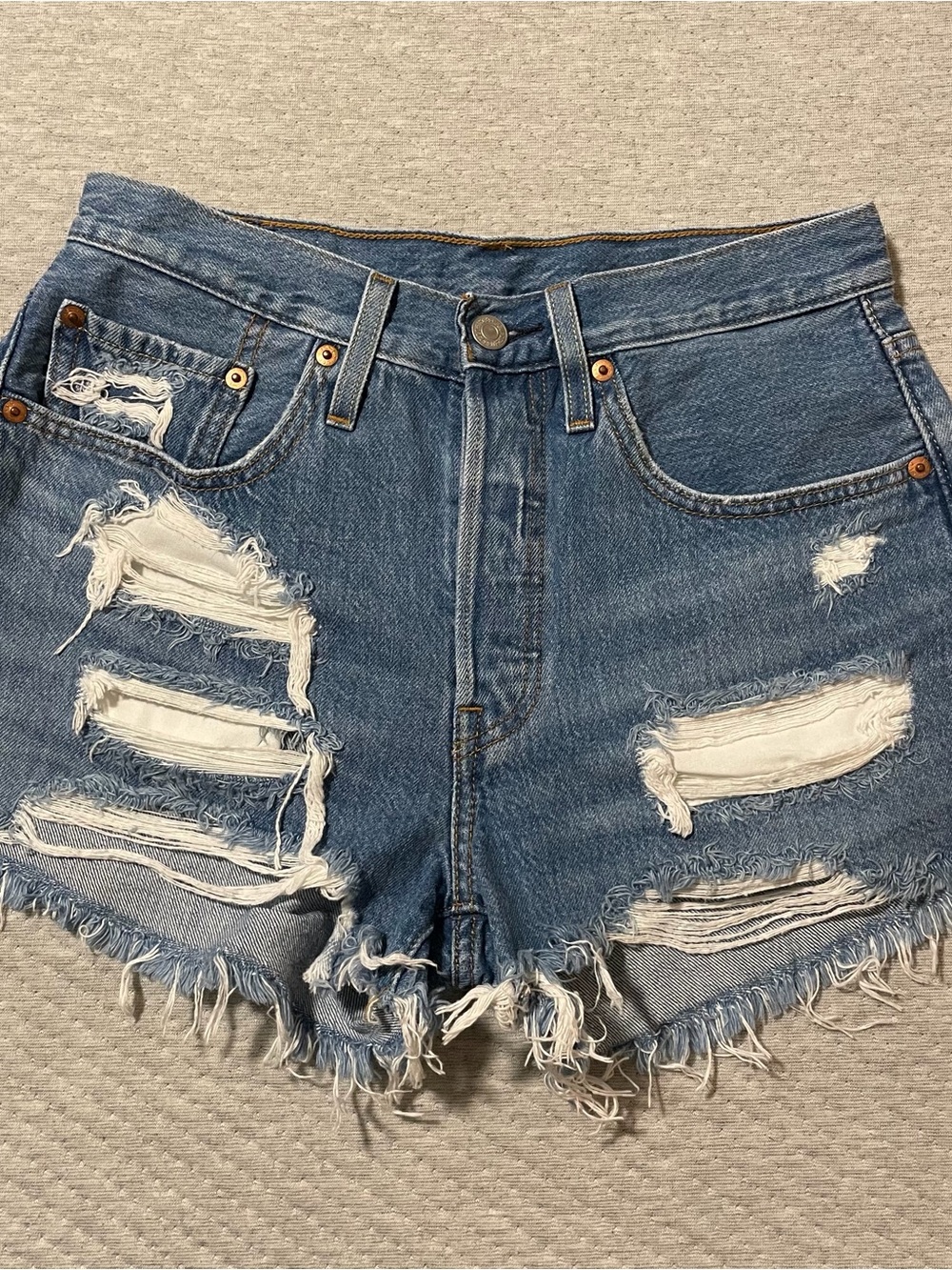 Levi's Medium Blue Distressed Frayed Hem Denim Shorts
